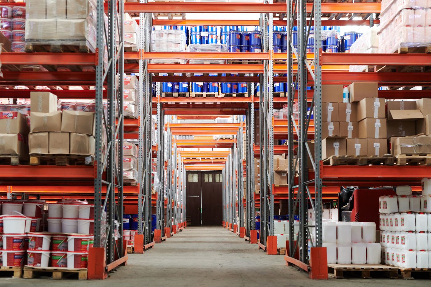 Warehouse racking stacked with stock